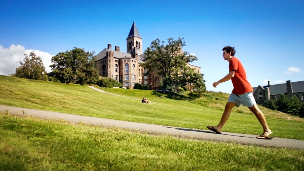 a student walks up the Slope