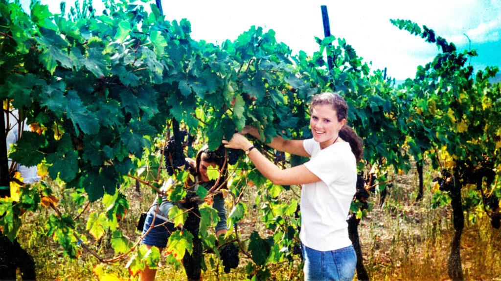 Napjus in a vineyard during a visit to a winery while studying abroad in Florence, Italy, in 1997.