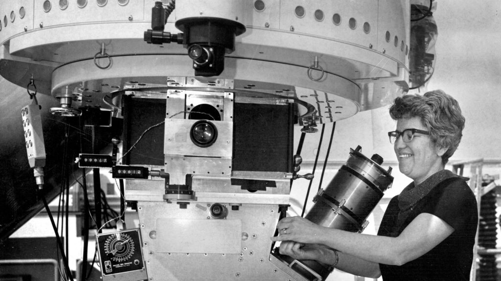 Vera Rubin is pictured using the Carnegie Institution Department of Terrestrial Magnetism's spectrograph at an 84-inch telescope at the Kitt Peak National Observatory in an undated photo