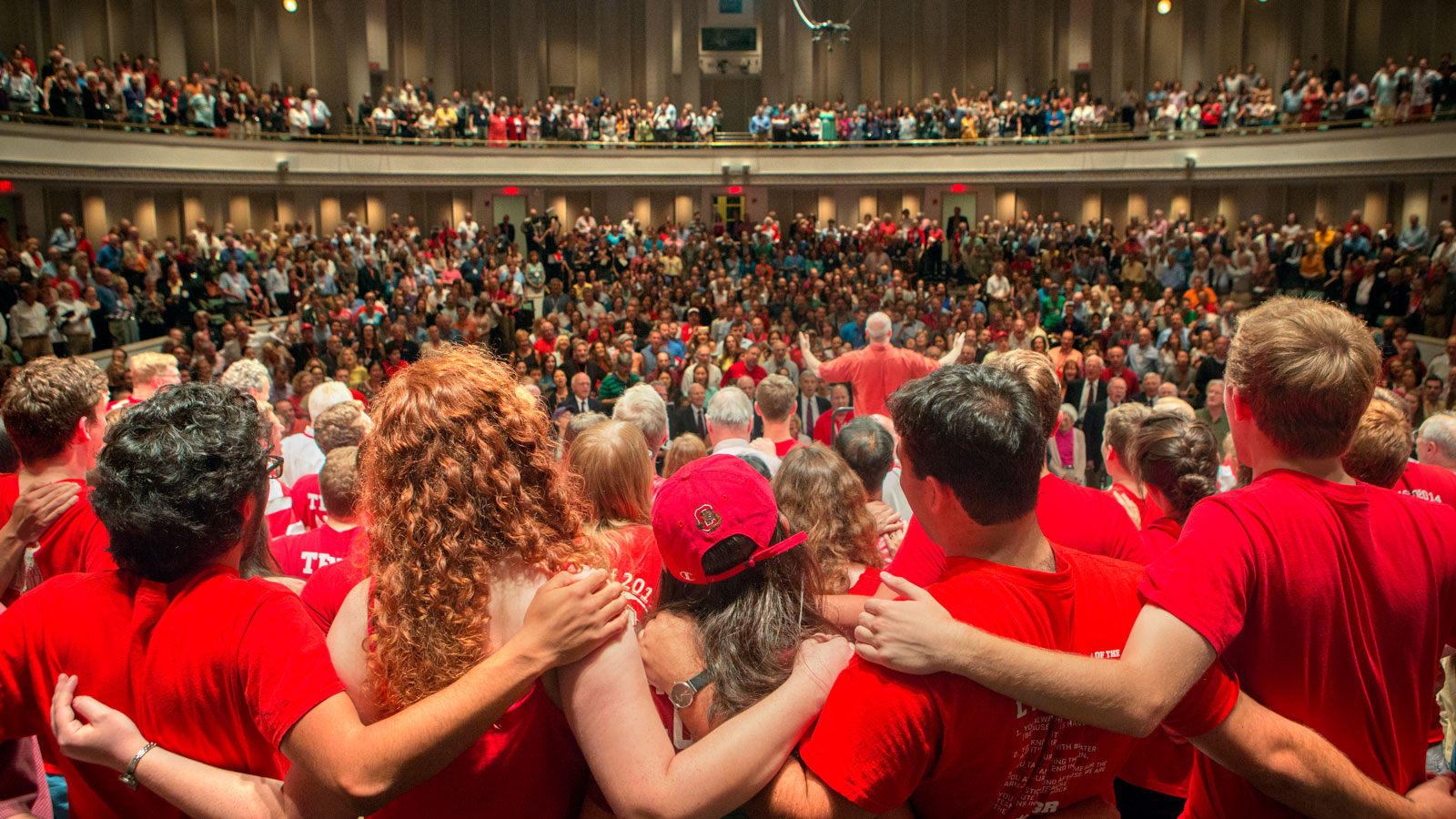 Alumni sing together in Bailey Hall during Reunion 2016’s Cornelliana Night