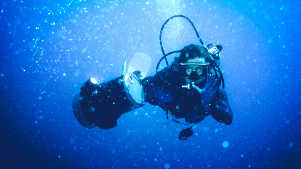 Jim Larison filming underwater