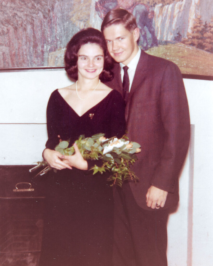 A 60s-era couple dressed in formal wear