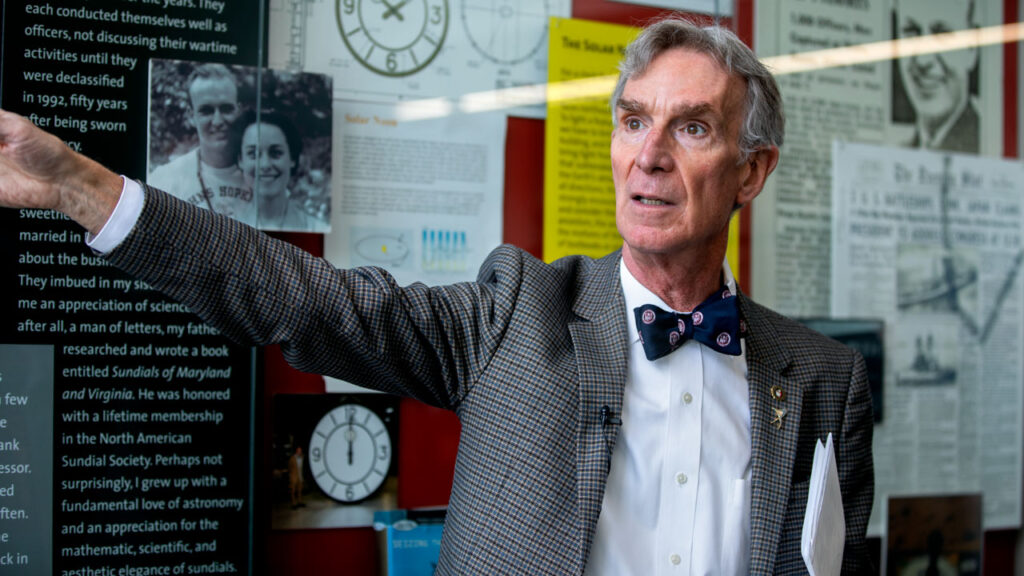 Bill Nye ’77 explains the finer points of solar noon during his March 15 campus visit in the lobby of Rhodes Hall; the display case behind him tells the story of Nye's father's fascination with sundials and the story of the Bill Nye Solar Noon Clock