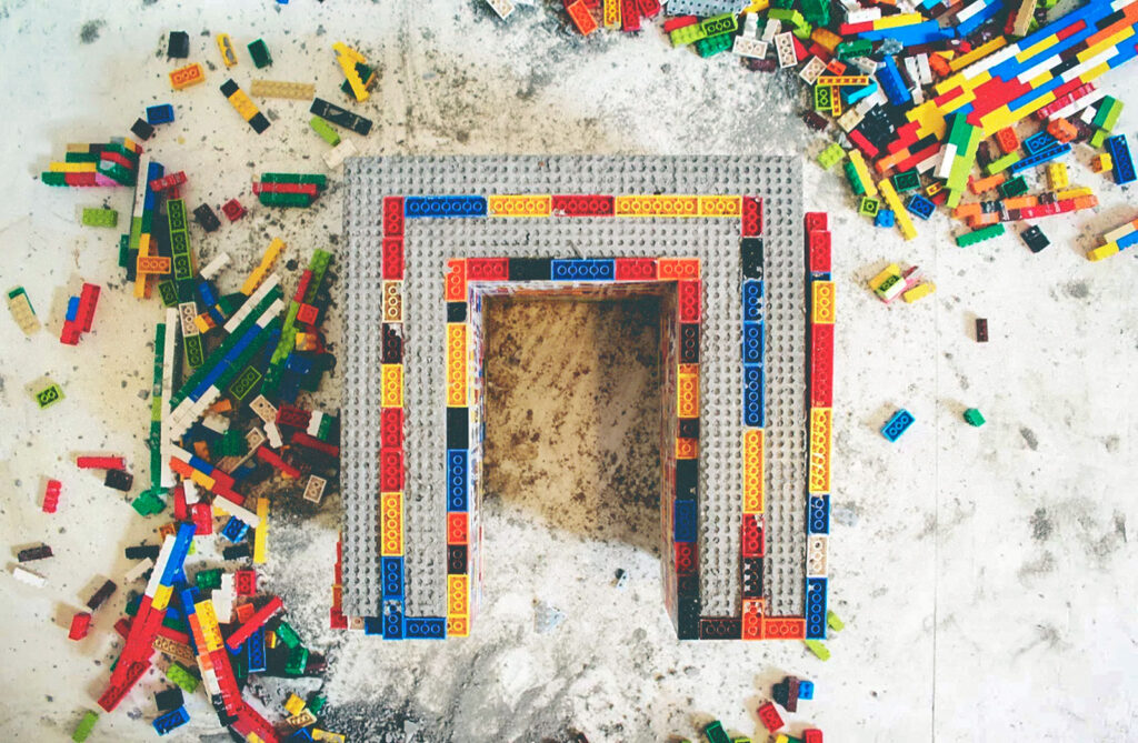 A concrete table formed by Lego blocks