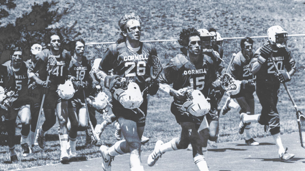 Lacrosse players running out onto the field in the mid-1970s