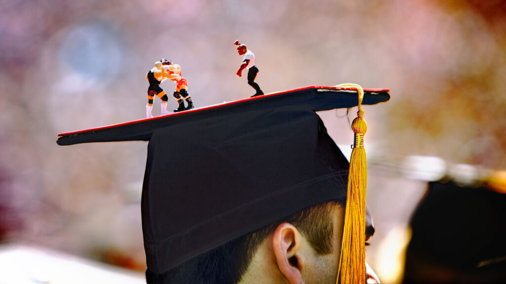 a decorated mortarboard on the head of a graduate at Commencement