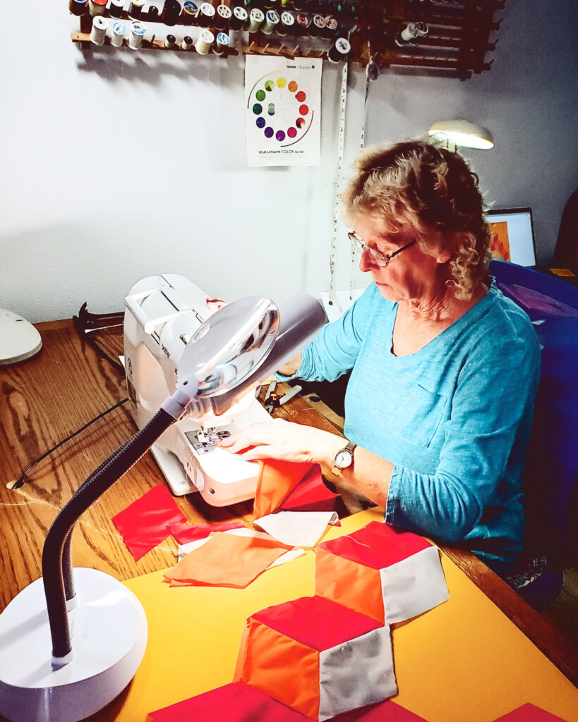 Linda Lambert at her sewing machine