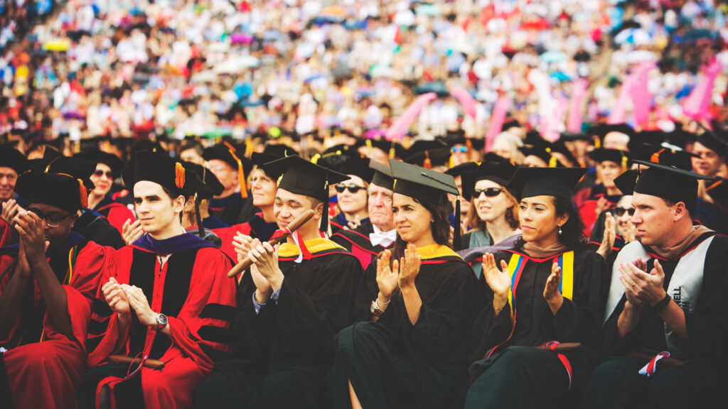 Graduates listing to speeches at Cornell Commencement 2016