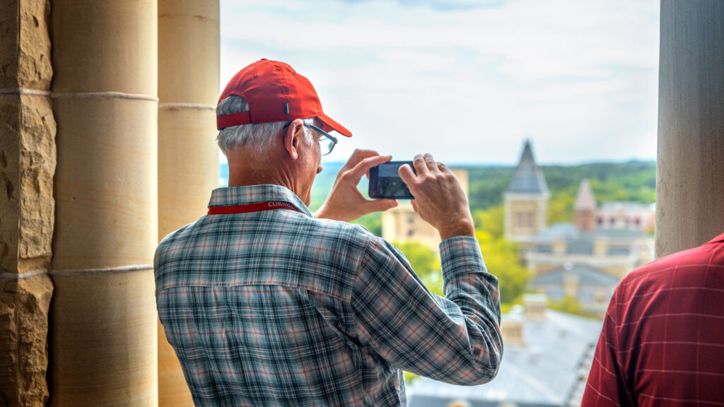 A Reunion attendee captures the vantage point from atop McGraw Tower