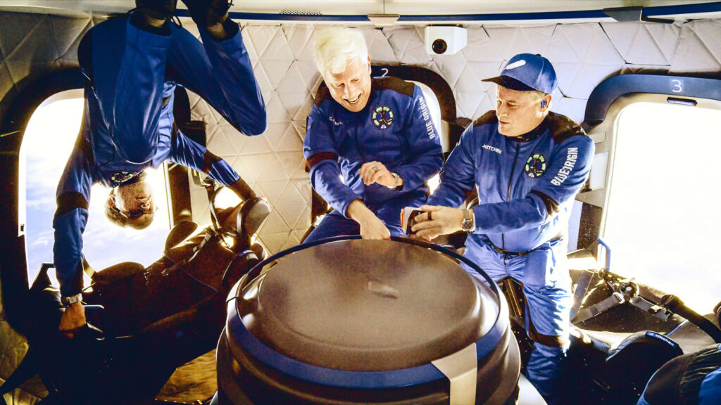 Gary Lai and other crew members enjoy weightlessness during the suborbital flight