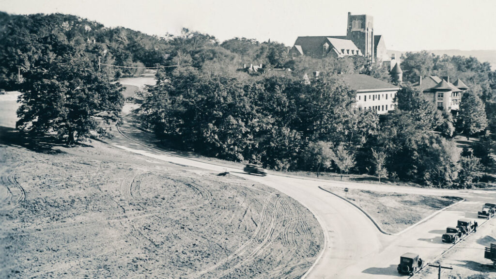 An early 1930s view of Campus Road with the white oak at left and the then-new Myron Taylor Hall at top right