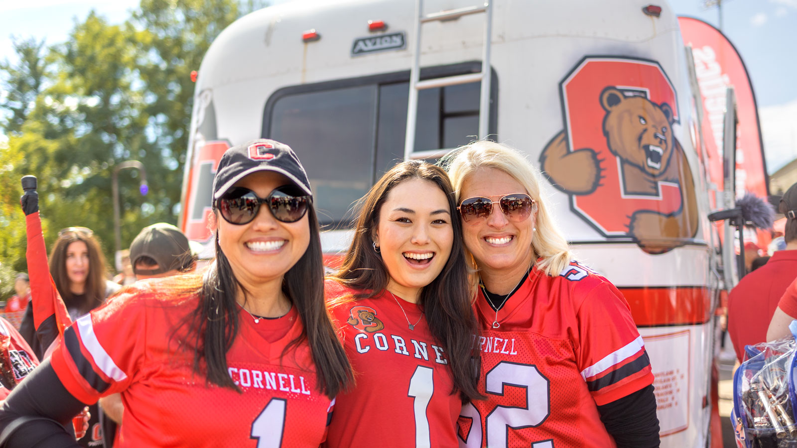 Cornellians enjoy the Homecoming Big Red Fan Festival in the Crescent Lot