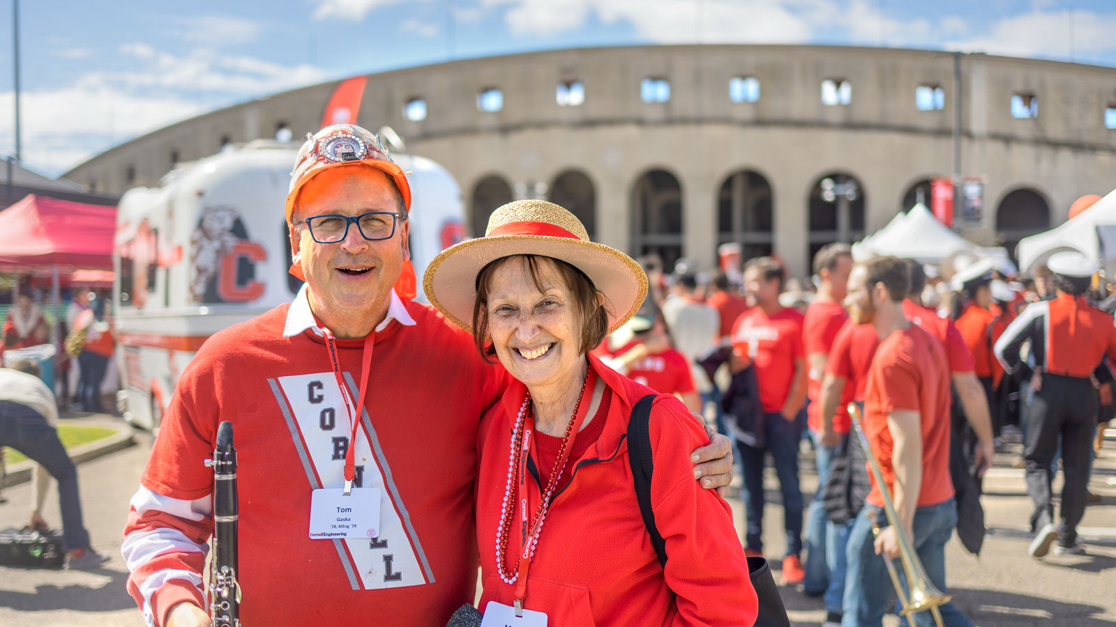 Alumni enjoy the Homecoming Big Red Fan Festival in the Crescent Lot