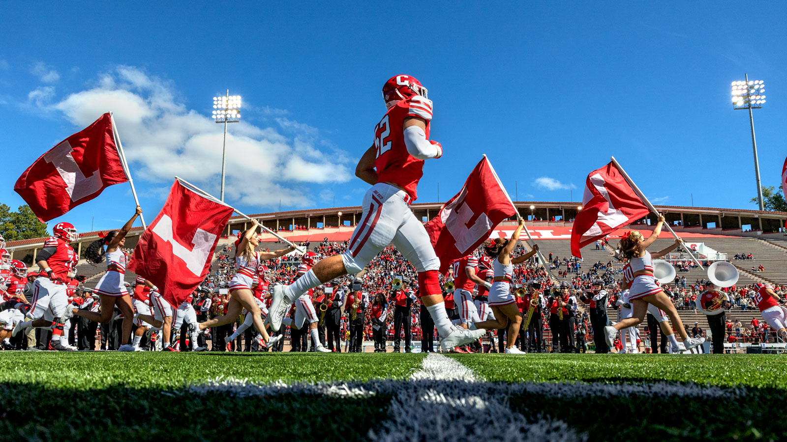 Cornell takes the field for the Homecoming football game against Yale at Schoellkopf
