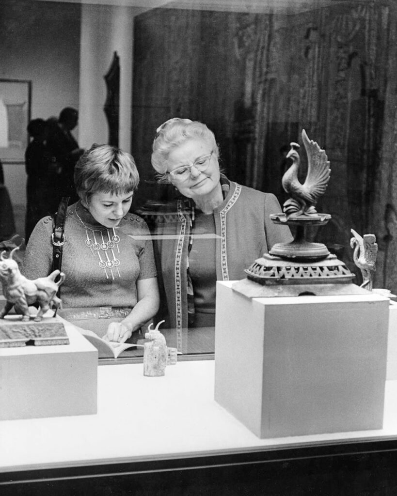 Two women at a museum exhibit