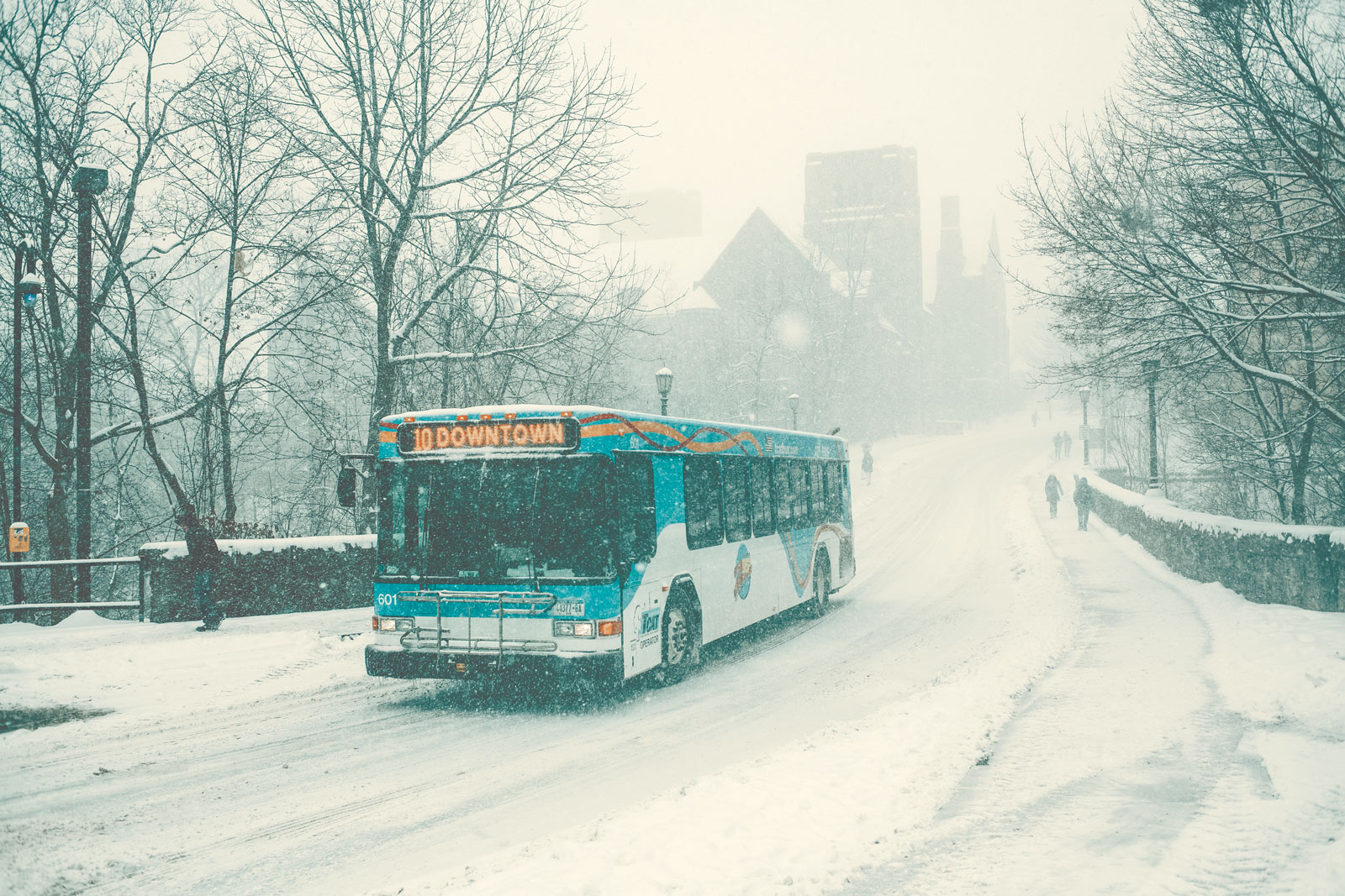 TCAT bus and winter view across the College Avenue bridge
