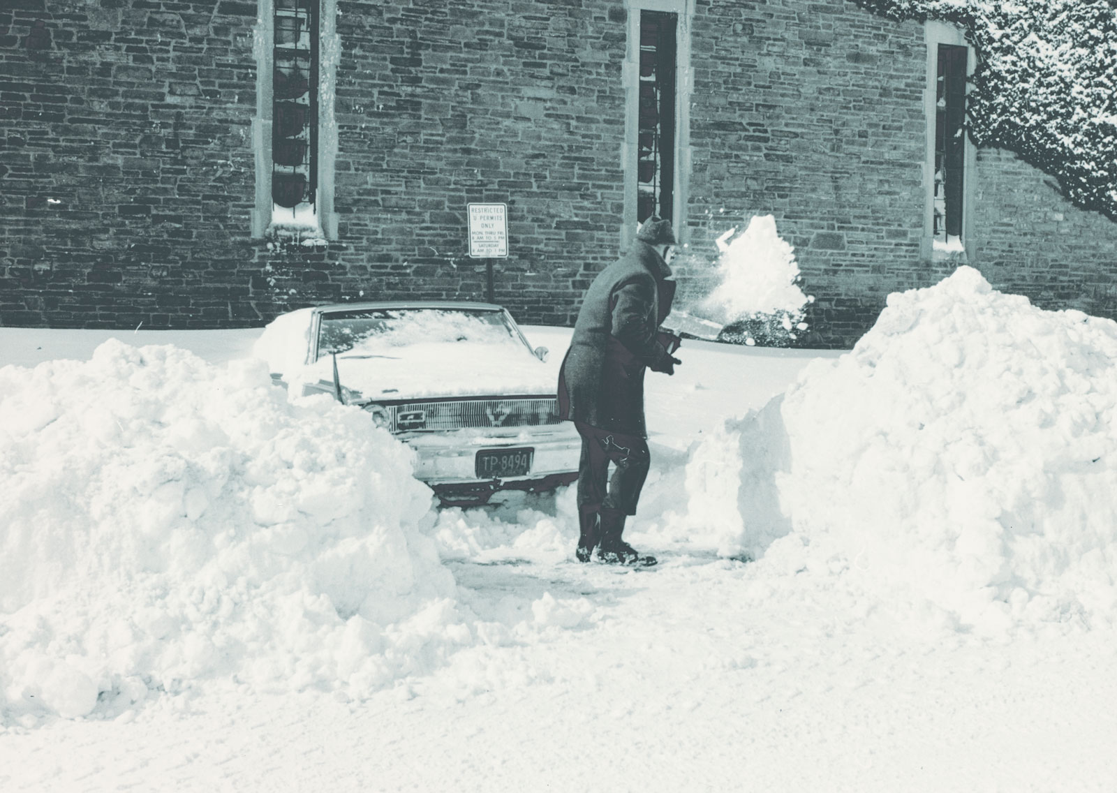 Shoveling out by Barton Hall, early 1970s