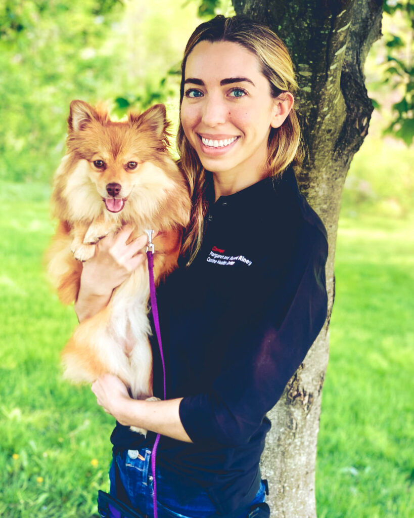 Dr. Aly Cohen with her pomeranian dog