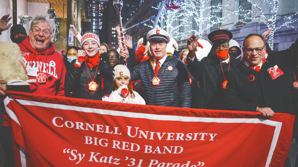 Club General Manager Craig Lansier, center, was honored as the grand marshal of the 2022 Sy Katz ’31 Parade, which celebrated 30 years of partnership with the Cornell Club–New York.