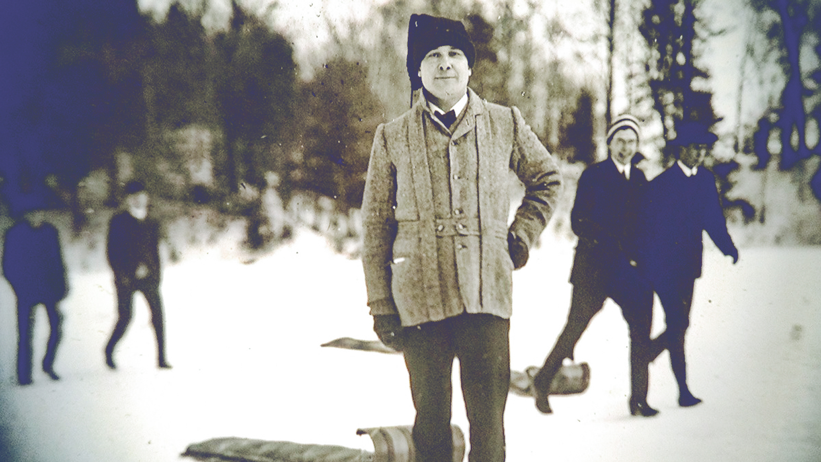Cornell President Jacob Gould Schurman, pictured in a lantern slide from 1908, following a toboggan run