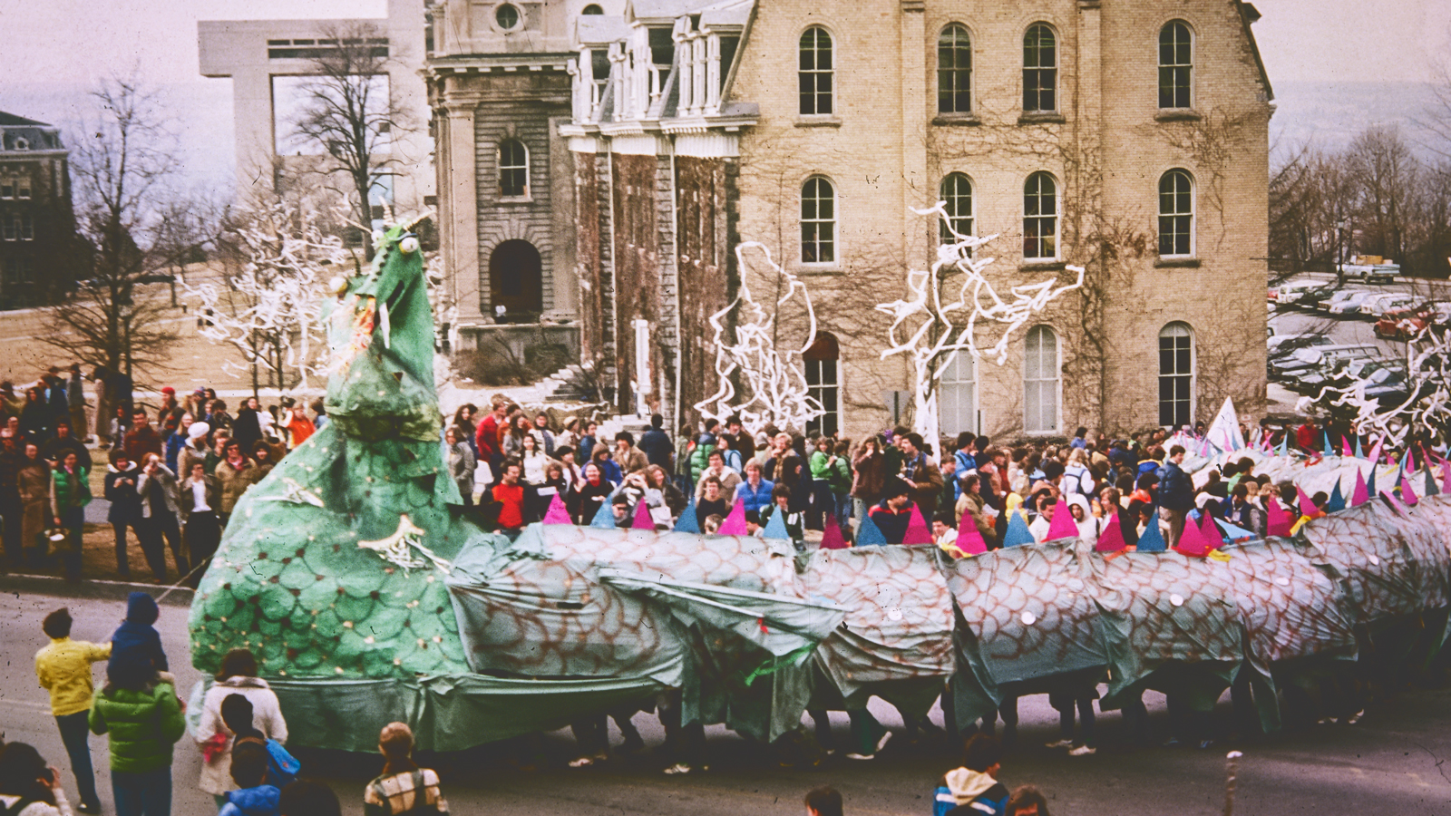 The dragon begins the parade route alongside Rand Hall in 1981