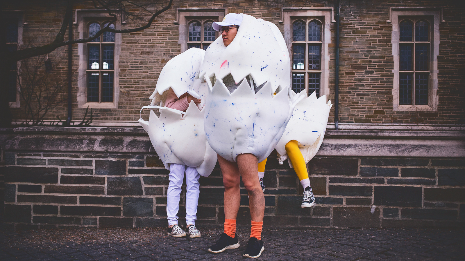 Costumed participants, dressed as eggs, watch the 2016 parade