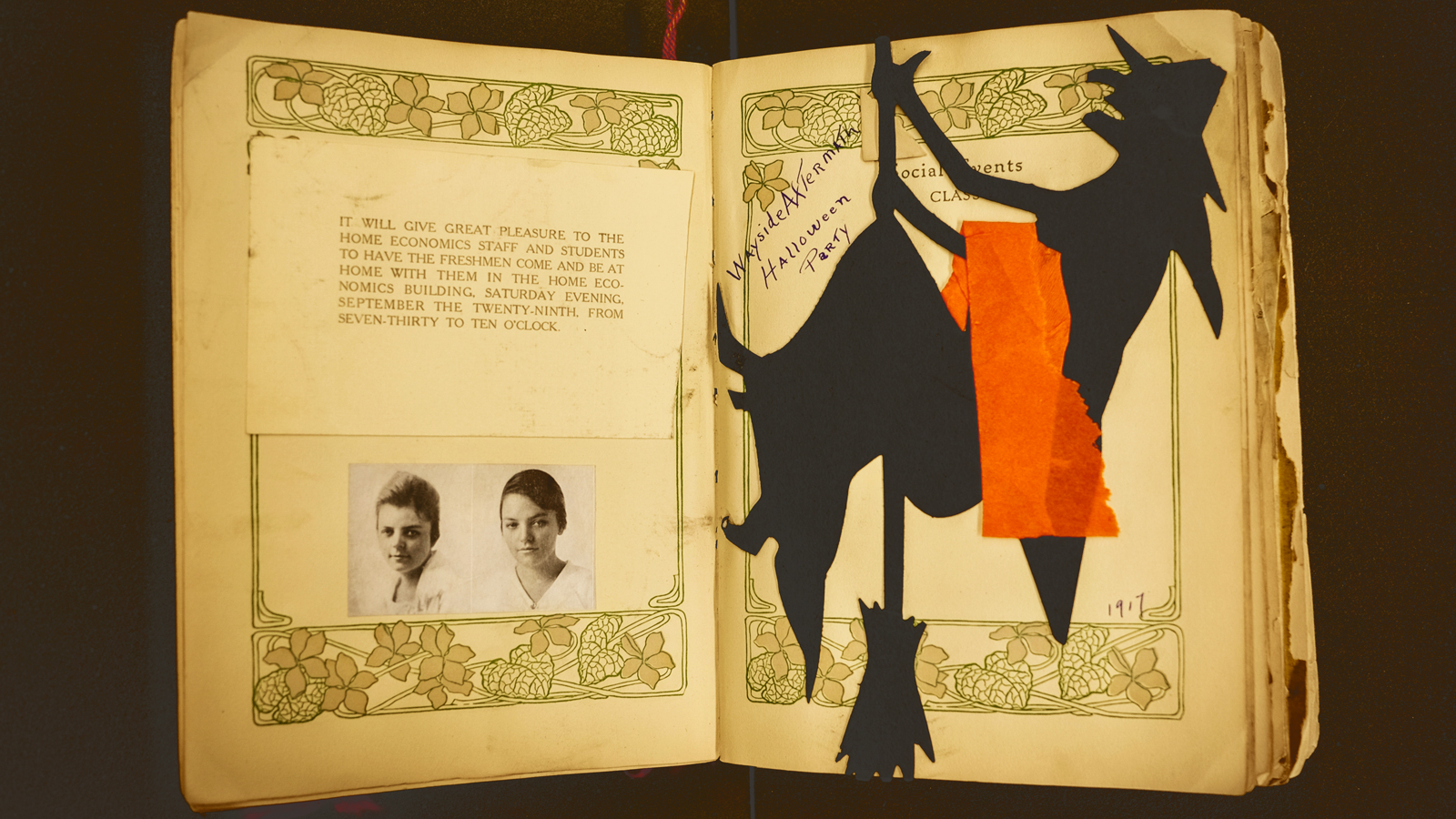 A Halloween decoration—with bold orange ribbon still attached—from a 1917 scrapbook