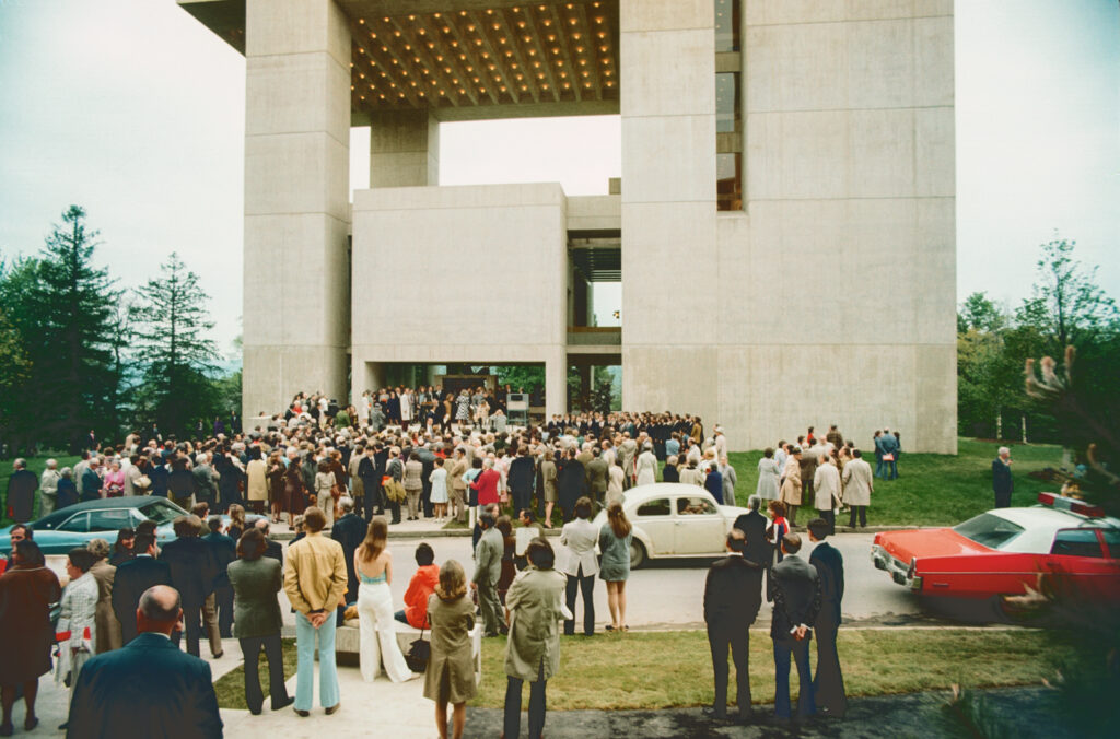 A crowd of people in front of the Johnson Museum of Art at Cornell University in the 1970s.