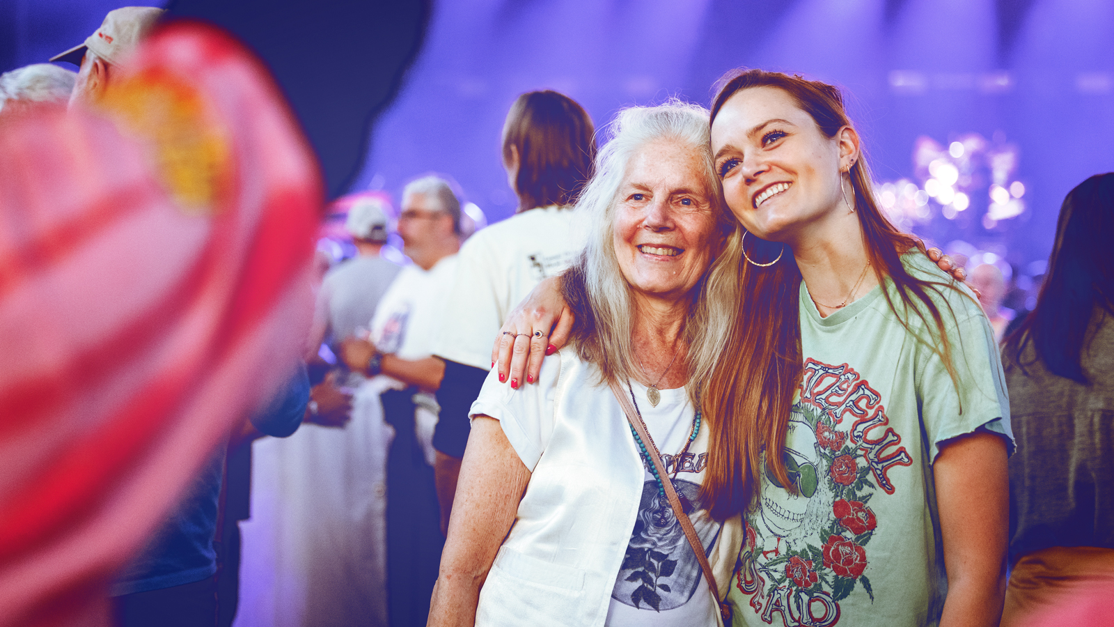 Two women pose for a picture at a Dead & Company concert at Cornell University.