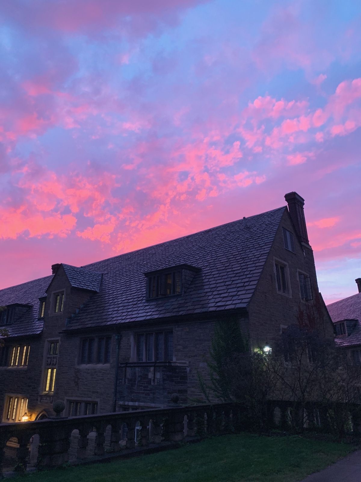 A cloudy pink sunset over Cornell University.
