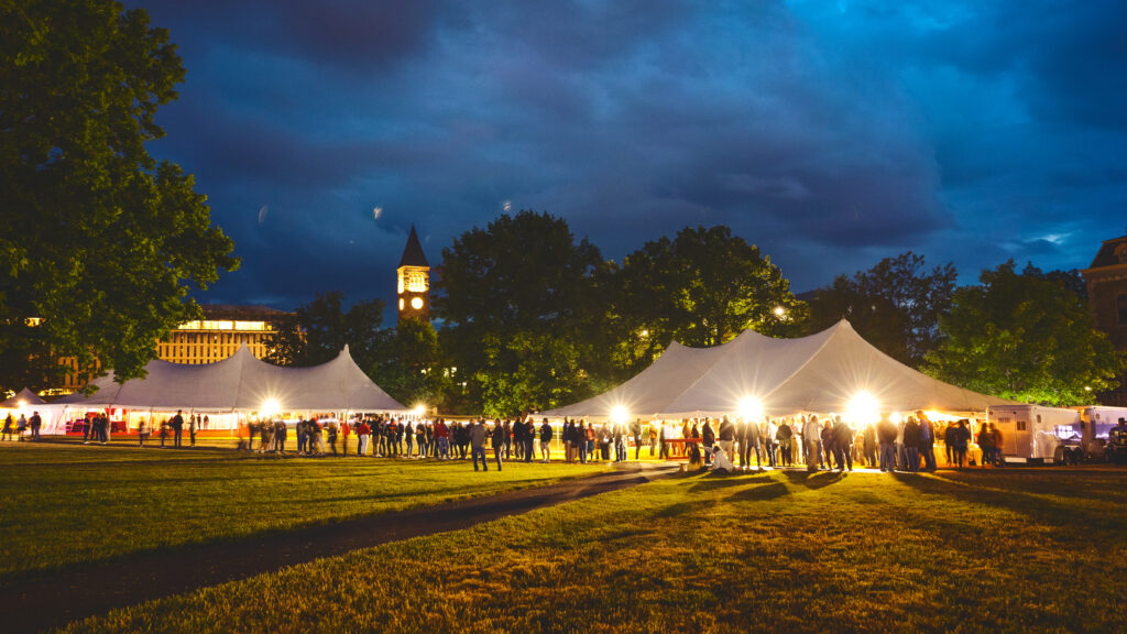 Alumni enjoy the Friday night tent parties on the Arts Quad during Reunion 2023
