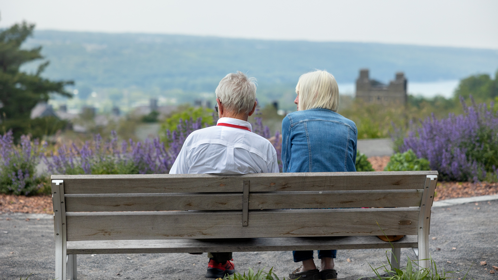 An alumni couple enjoys the view over Libe Slope during Reunion 2023