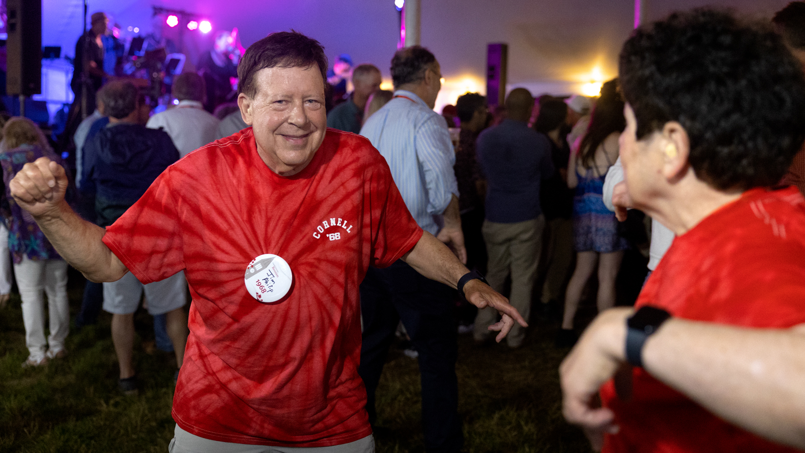 Alumni dance during tent parties on the Arts Quad at Reunion 2023