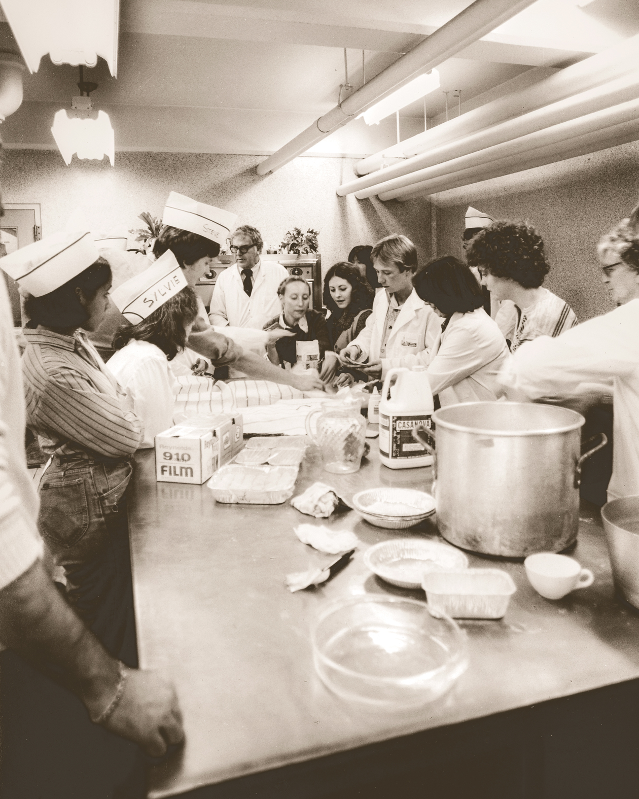 Bob Baker, center, with students in his food lab in Bruckner Hall