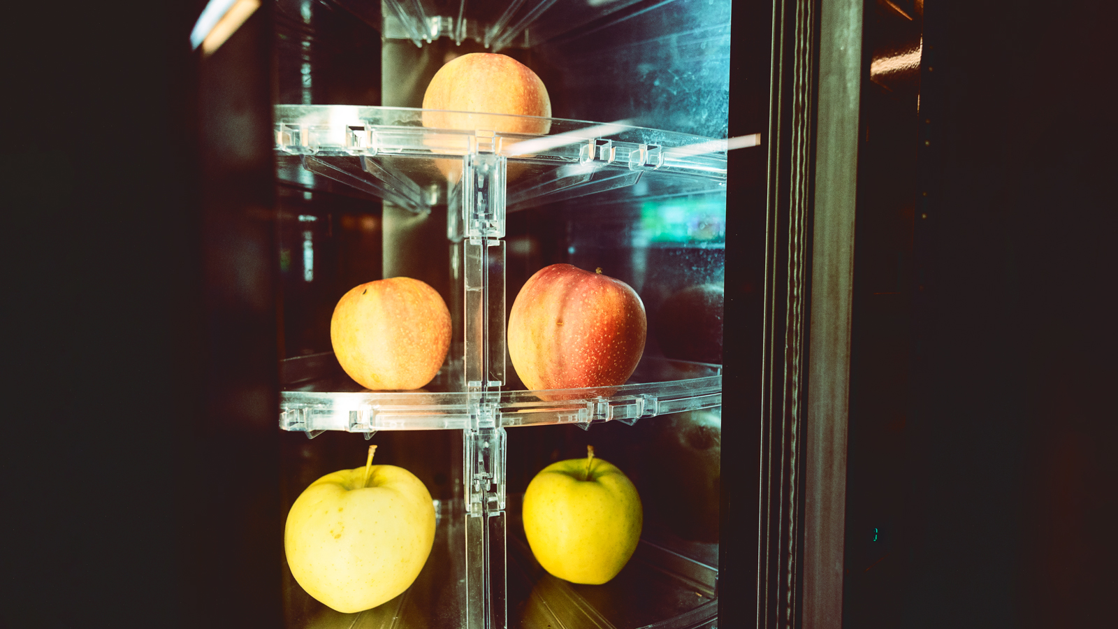 Apples stocked in the vending machine in front of Mann Library