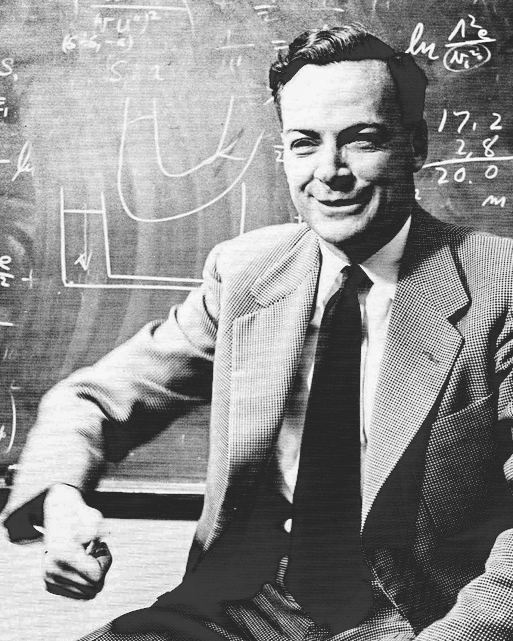 Richard Feynman in front of a chalkboard