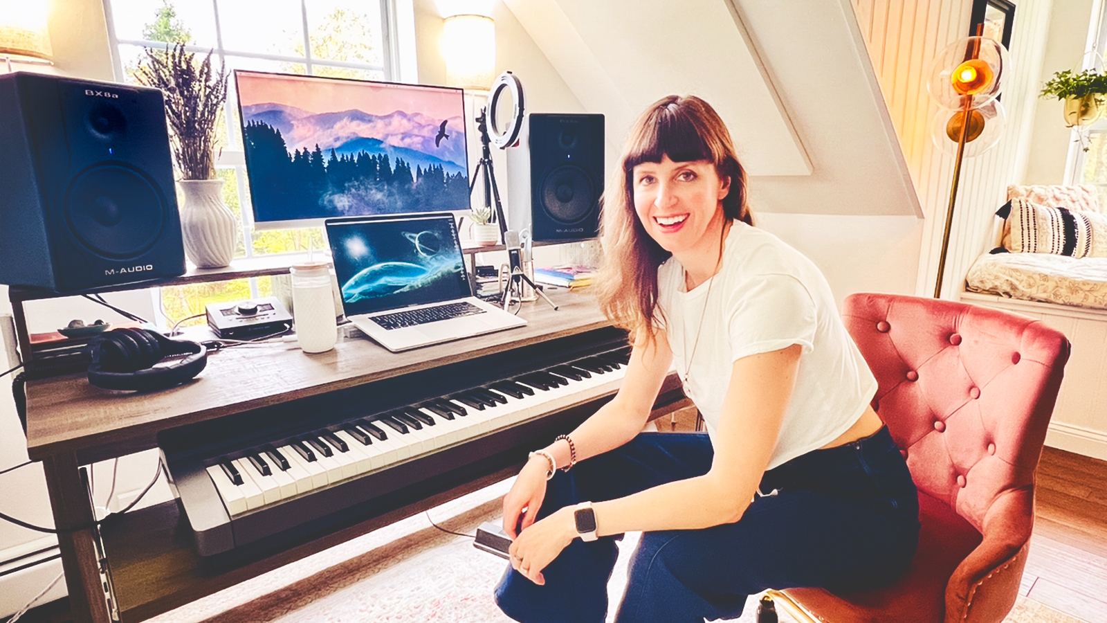 Cheryl Engelhardt sits at her piano in her home studio.