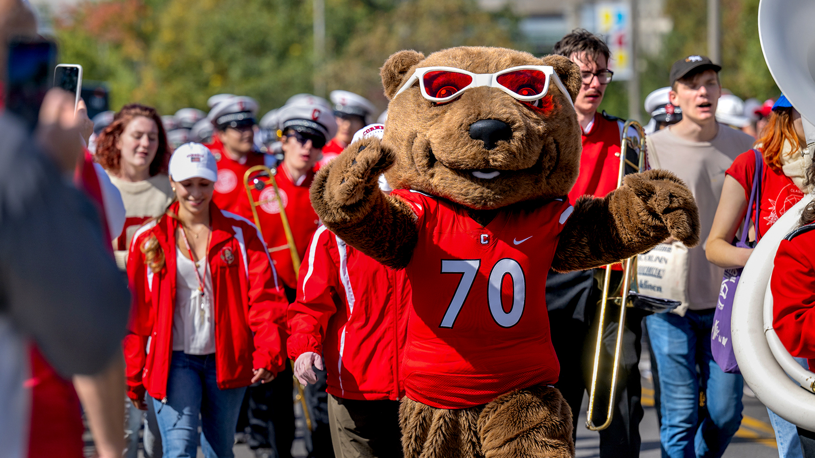Accompanying the Marching Band, Touchdown brings his Big Red best