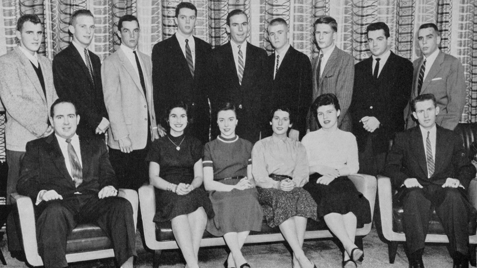 Feeney is pictured at bottom right in this 1956 photo of the Cornell Hotel Association