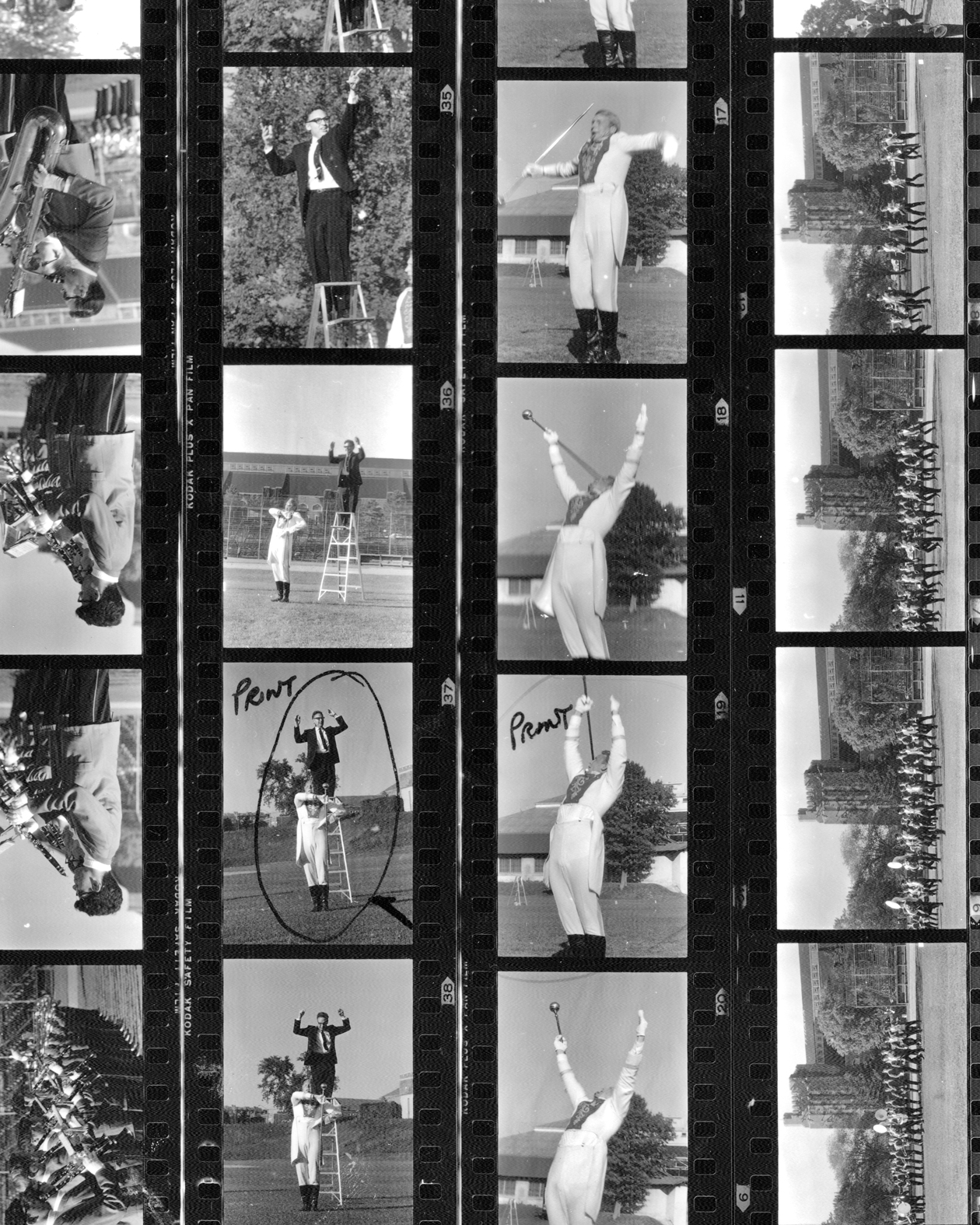 Marked selections on a contact sheet show chosen images from a Big Red Band performance