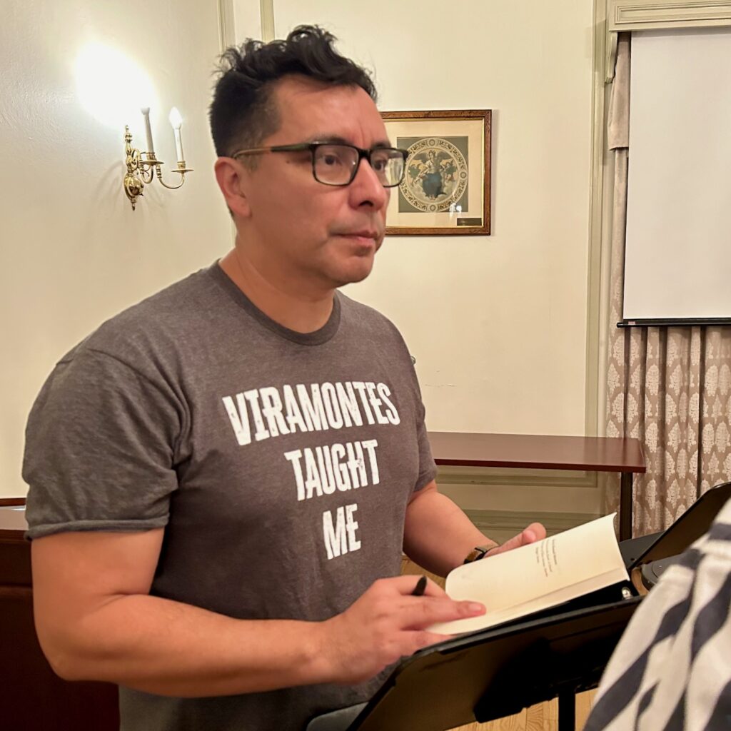 Manuel Muñoz sports a "Viramontes Taught Me" shirt at the recent on-campus conference honoring his mentor