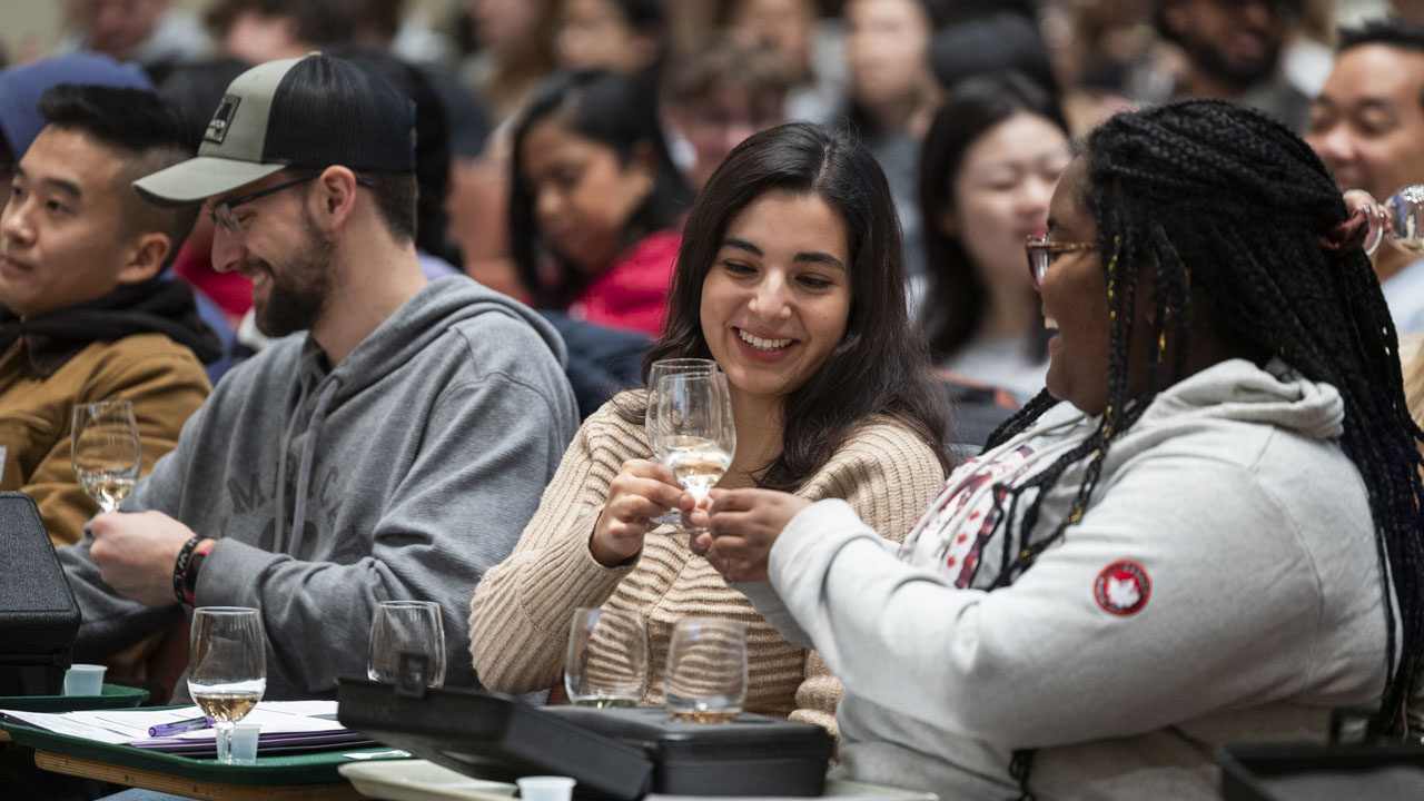 Students sample wine in class