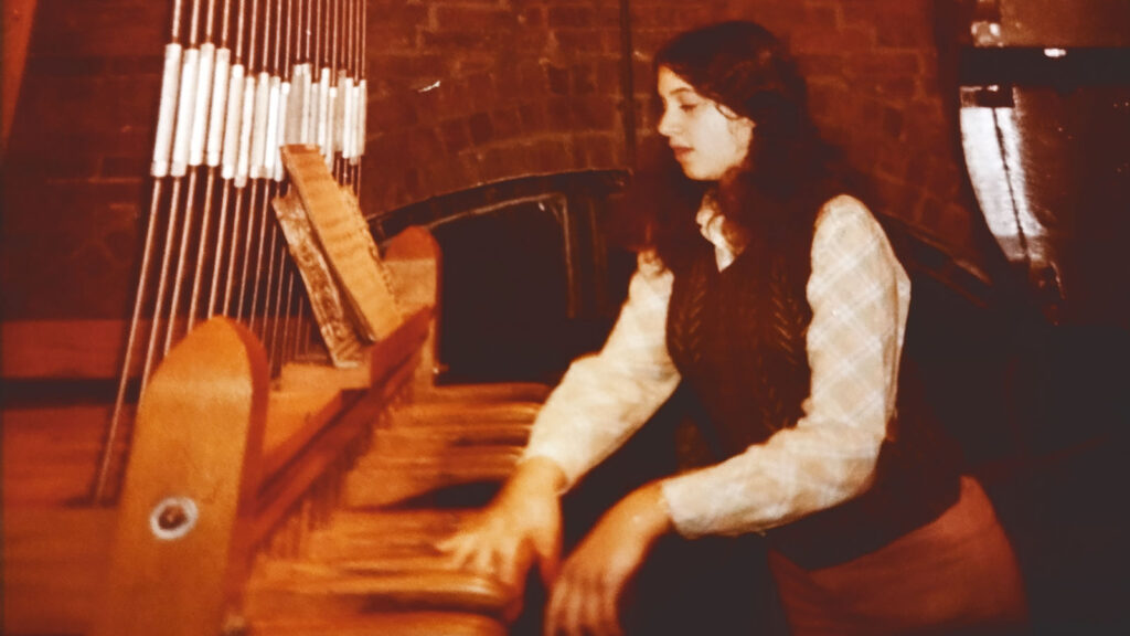 Dina Friedman playing the chimes as a student