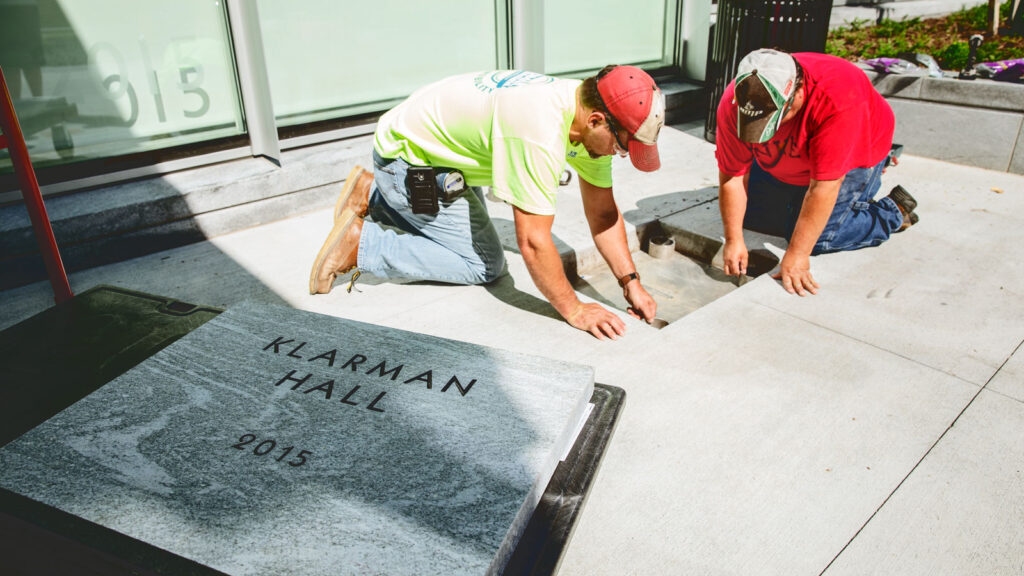 The Klarman Hall time capsule is buried for a half-century’s internment, 2016