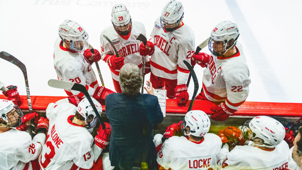 Mike Schafer talks with forwards on the Cornell men’s hockey team during a break in play in an ECAC Hockey and Ivy League game against Harvard on Jan. 25, 2020 at Lynah Rink in Ithaca, N.Y. (Eldon Lindsay/Cornell Athletics)