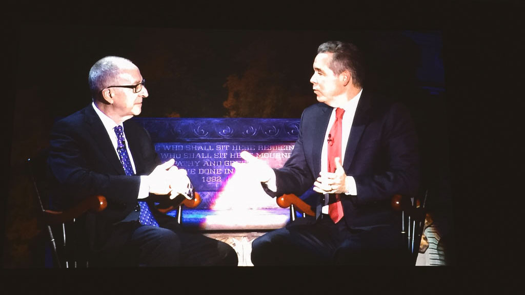 John Toohey-Morales interviewing then-Cornell President David Skorton on stage as part of Sesquicentennial celebrations in 2015