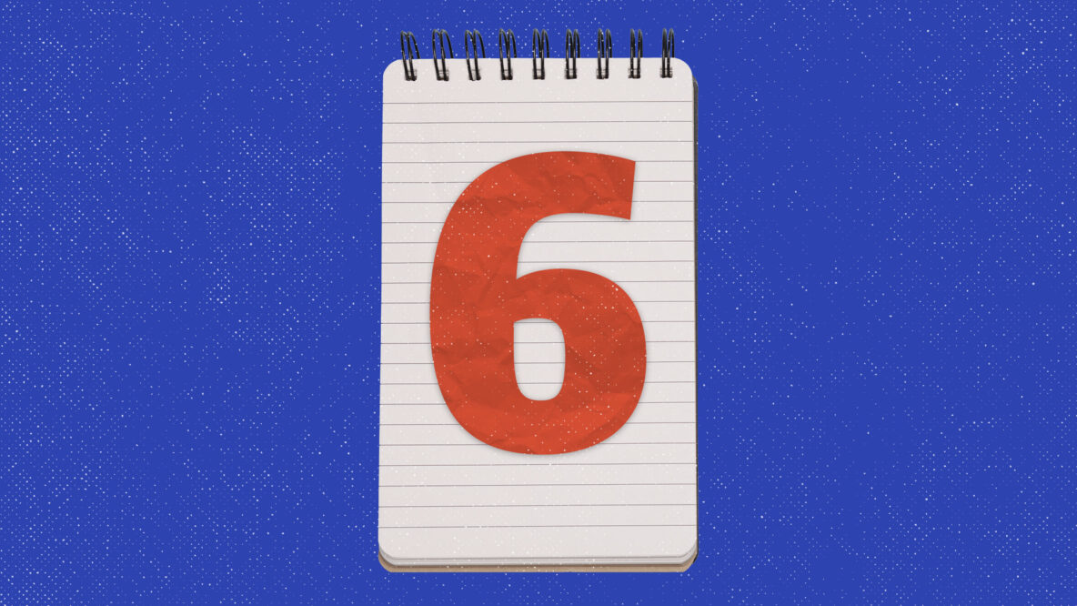 The number 6 in orange, on a white spiral notebook, on a blue background