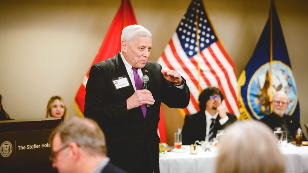 Gen. John Paxton speaking to an audience at a formal dinner