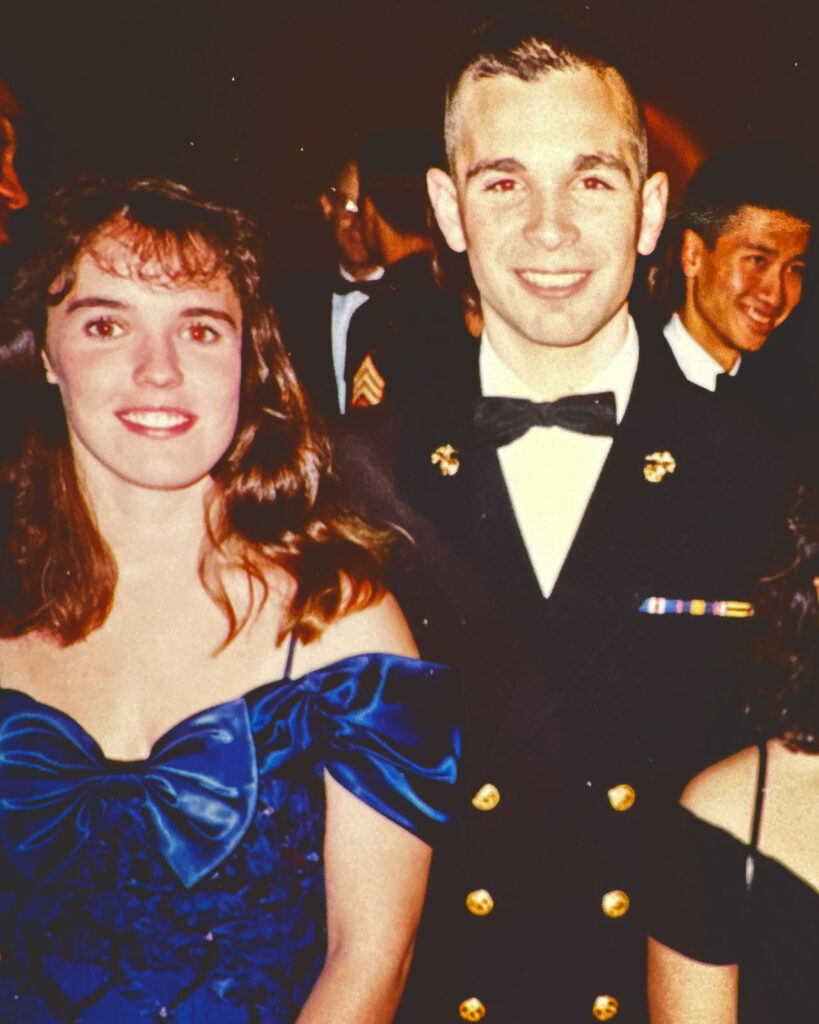 Rick Gannon in dress uniform with his wife, Sally, in a blue gown