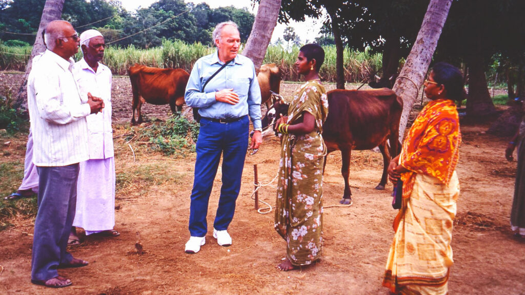 Professor Royal Colle (center) seeking information for a rural communication project in India.